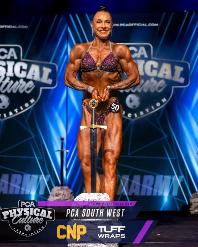 Team CJM competitor on stage