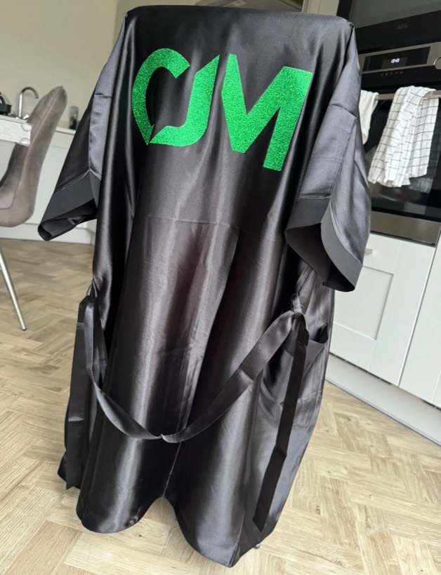 CJM Competition Robe hanging, back view