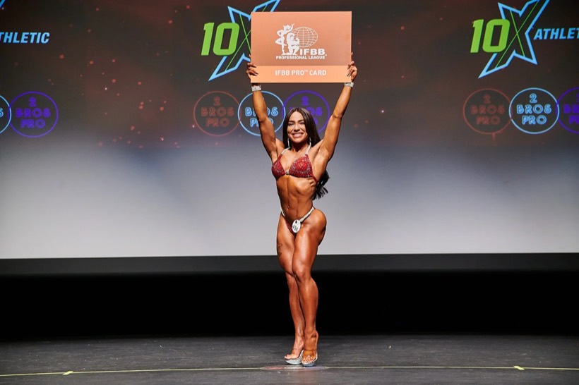 Team CJM athlete celebrating on stage