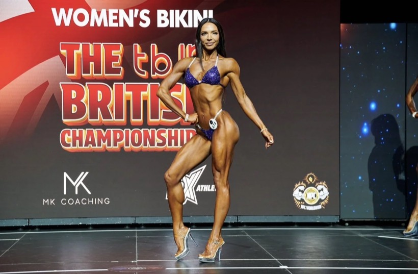 Team CJM competitor on stage