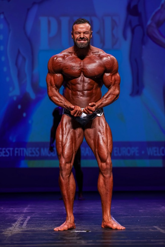 Team CJM competitor on stage