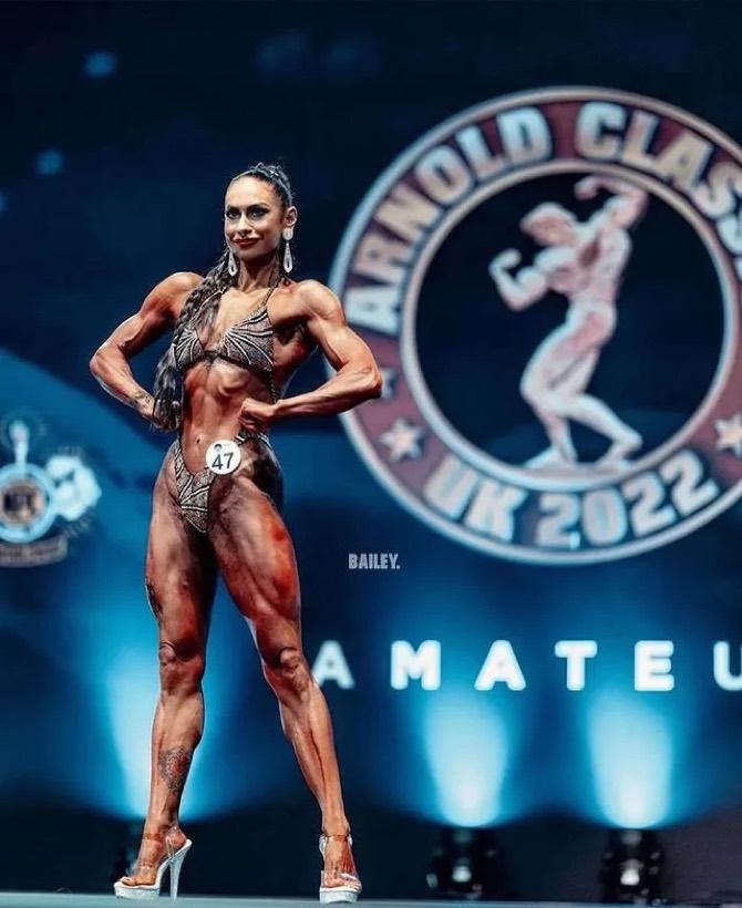 Team CJM competitor on stage